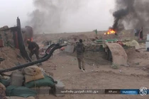 Ảnh: IS tấn công ác liệt, đốt trại của quân đội Iraq