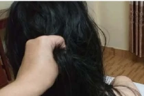 Qua đêm với ông chủ nhà nghỉ, cô gái trẻ bị đánh ghen đau đớn