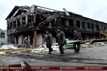 Hàng chục thi thể trong hố chôn tập thể đông Ukraine