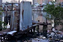 Chùm ảnh: Cuộc sống “đen” giữa lòng Sài Gòn hiện đại