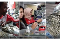 Cha nghèo dốc sạch tiền lẻ mua điện thoại chiều con 