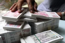 Bát nháo chi phí đổi tiền lẻ, tiền mới