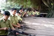 Khi nào cán bộ kiểm lâm được dùng súng?