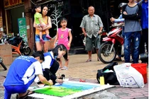 Sinh động những bức tranh trên nắp cống bẩn ở Sài Gòn 