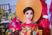 Ngọc Quyên biến hóa với áo dài khăn đóng