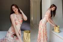 Chị gái Thiều Bảo Trâm khoe dáng đồng hồ cát trong váy ôm sát