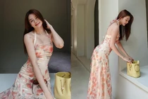 Chị gái Thiều Bảo Trâm khoe dáng đồng hồ cát trong váy ôm sát