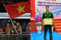 Chàng trai cầm cờ trong bức ảnh Việt Nam tại Olympic gây bão mạng