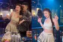 Hot girl mặc đồ tập, mang cả vợt pickleball vào bar gây chú ý