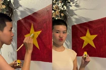 Rapper Pháo "đu trend" vẽ lá cờ Tổ Quốc ở ban công nhà