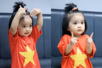 Con gái Khánh Thi - Phan Hiển mặc áo cờ đỏ sao vàng siêu cưng