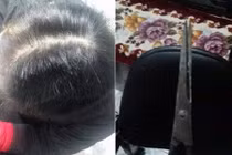 Kinh hoàng: Chồng đánh đập vợ, cắt trụi tóc trước mặt con