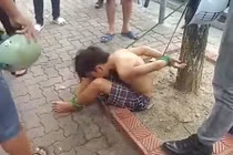 Công an Hà Nội tạm giữ 3 người bắt trói thiếu niên đánh giày