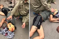 Hốt hoảng thanh niên cầm búa tự đập vào đầu giữa đường Hà Nội