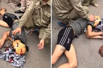 Hốt hoảng thanh niên cầm búa tự đập vào đầu giữa đường Hà Nội