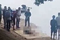 Hãi hùng phát hiện thi thể cô gái trẻ nổi trên hồ Linh Đàm
