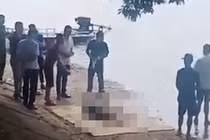 Hãi hùng phát hiện thi thể cô gái trẻ nổi trên hồ Linh Đàm