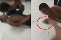 Ông bố bắt con nhổ nước bọt vào miệng nhau bất hợp tác với công an