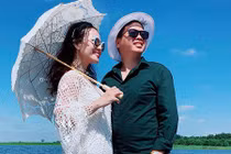 Vợ xinh từ bỏ hào quang để đứng sau “vua nhạc đỏ” Đăng Dương