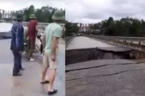 Hãi hùng lũ cuốn mố cầu, hàng chục người may mắn thoát chết