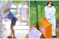 Hình ảnh chồng Việt Hương vác gạo, khiêng áo quan khi làm từ thiện