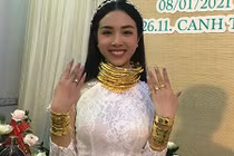 Á hậu Thúy An được tặng 13 cây vàng đeo trĩu cổ ngày cưới