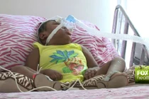 Kỳ lạ bé gái 6 tuổi không có não