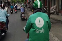 Kinh hoàng tài xế GrabBike bị hành khách đâm nhiều nhát