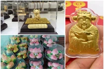 Lì xì Thần Tài, linh vật trâu vàng...giá rẻ hút khách ngày vía Thần Tài