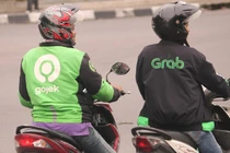 Tranh phần 500 triệu USD: Đối thủ lớn nhất rút lui, ai đủ sức đấu Grab