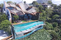 Đẹp hút mắt nhà mái sóng cheo leo trên vách đá 