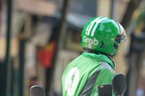 Tại sao Grab kỳ kèo, không nhượng bộ tài xế 1%?