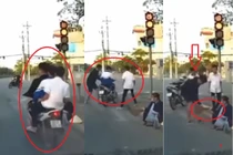 Nhóm thanh niên "kẹp 3" vượt đèn đỏ có hành động bất ngờ 