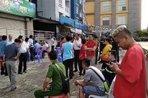 Hiện trường vụ cháy chung cư Carina Plaza khiến 13 người thiệt mạng