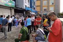 Hiện trường vụ cháy chung cư Carina Plaza khiến 13 người thiệt mạng