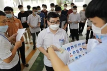 Hơn 7.000 thí sinh bước vào kỳ thi đánh giá tư duy của Đại học Bách Khoa. (Ảnh: Thanh Tùng/TTXVN).