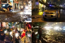 TP.HCM: Mưa lớn khủng khiếp, đường phố nước cuồn cuộn như sông