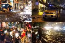TP.HCM: Mưa lớn khủng khiếp, đường phố nước cuồn cuộn như sông