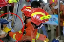 Video: Nghẹt thở xem giải cứu bé trai kẹt đầu giữa hai cửa kính
