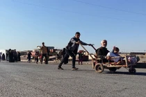 Cảnh người dân Iraq tháo chạy ở Mosul 
