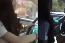 Gái trẻ vừa lái ô tô, vừa lắc lư điên cuồng