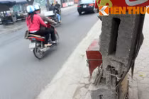 Cột điện gãy, nghiêng ngả... khiến dân Hà Nội khiếp vía 