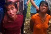 Thảm sát ở Yên Bái: Ảnh nghi can cùng người tình khi bị bắt