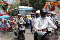 Xem người Hà Nội vật vã tìm cách tránh nắng