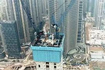 Cận cảnh cỗ máy khổng lồ, xây nhà chọc trời cực nhanh