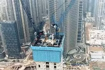 Cận cảnh cỗ máy khổng lồ, xây nhà chọc trời cực nhanh