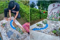 Nhói lòng cảnh ông bố ra thăm mộ con gái và trang trí thật đẹp