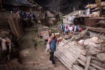 Chùm ảnh làng Trung Quốc nằm sâu trong hang động