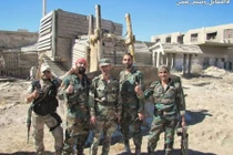 Ảnh quân đội Syria đánh trả phiến quân ở quận Al-Qaboun 