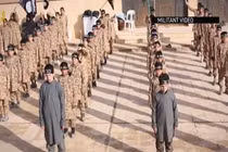 IS huấn luyện “chiến binh nhí” chặt đầu búp bê 